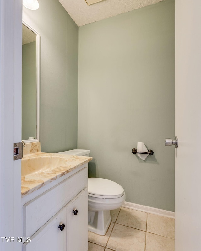 515 Pilgrim Ct Unit B, Johnson City, TN 37601 - half bathroom with toilet, tile patterned flooring, vanity, and baseboards