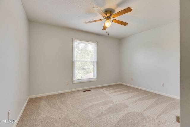 515 Pilgrim Ct Unit B, Johnson City, TN 37601 - unfurnished room with carpet flooring, baseboards, a ceiling fan, and a textured ceiling