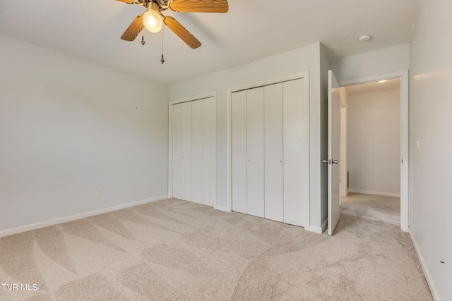 515 Pilgrim Ct Unit B, Johnson City, TN 37601 - unfurnished bedroom featuring carpet, multiple closets, and baseboards