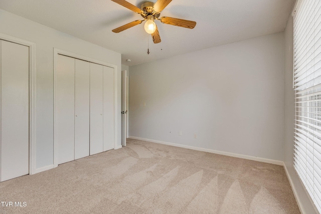515 Pilgrim Ct Unit B, Johnson City, TN 37601 - unfurnished bedroom with carpet, multiple windows, and ceiling fan