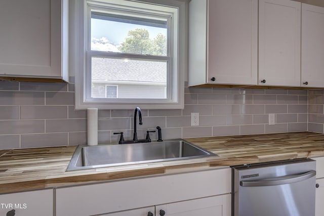 2116 Steadman St, Kingsport, TN 37664 - kitchen featuring butcher block counters, dishwasher, a sink, and white cabinets