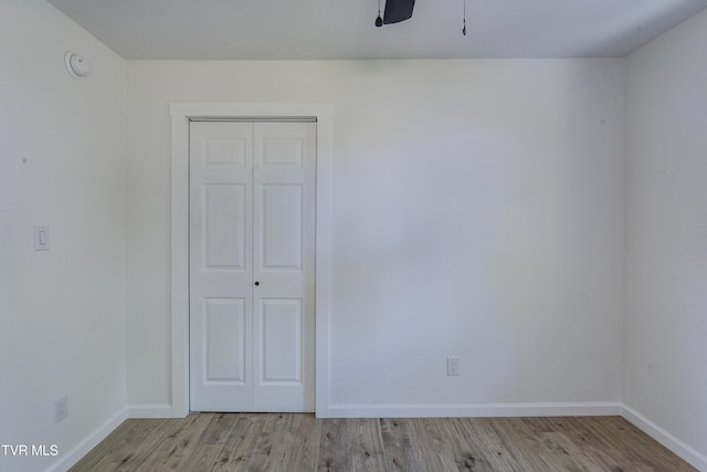 2116 Steadman St, Kingsport, TN 37664 - spare room with wood finished floors, baseboards, a smoke detector, and a ceiling fan