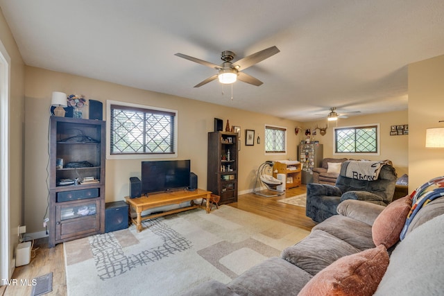 373 Mckeehan Ridge Rd, Elizabethton, TN 37643 - living area with a ceiling fan, wood finished floors, and baseboards