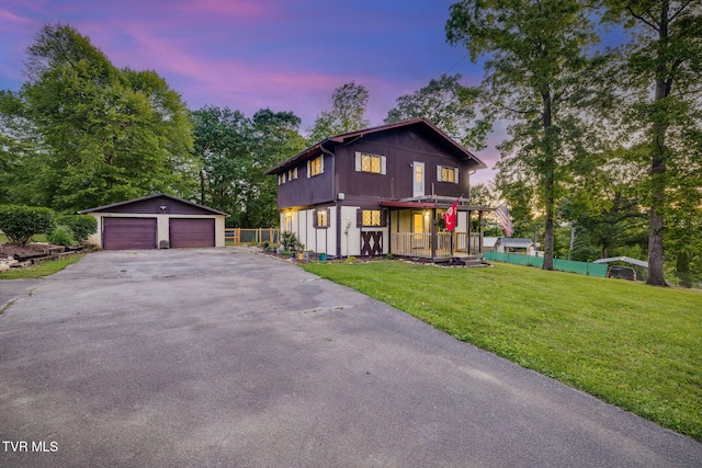 373 Mckeehan Ridge Rd, Elizabethton, TN 37643 - view of front of home with an outdoor structure, a detached garage, and covered porch
