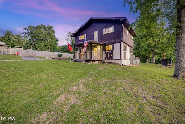 373 Mckeehan Ridge Rd, Elizabethton, TN 37643 - back of property at dusk featuring a porch