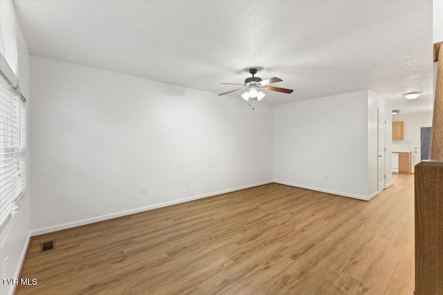 212 Amanda Ln Unit 2, Bristol, TN 37620 - unfurnished room featuring a ceiling fan, light wood-type flooring, and baseboards