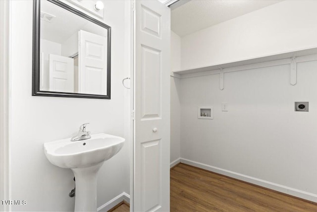 212 Amanda Ln Unit 2, Bristol, TN 37620 - bathroom featuring baseboards and wood finished floors