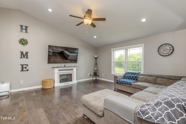 living area with vaulted ceiling, ceiling fan, hardwood / wood-style floors, recessed lighting, and baseboards