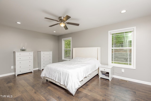 bedroom with dark wood-style floors, baseboards, recessed lighting, and ceiling fan