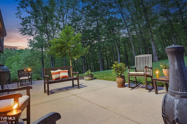 150 NW New Melrose St, Coeburn, VA 24230 - patio terrace at dusk featuring an outdoor fire pit