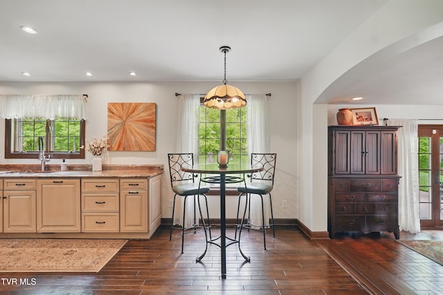150 NW New Melrose St, Coeburn, VA 24230 - dining area with arched walkways, dark wood finished floors, recessed lighting, baseboards, and a chandelier