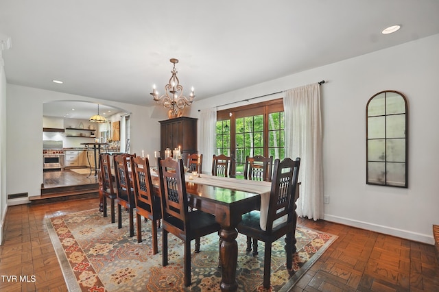 150 NW New Melrose St, Coeburn, VA 24230 - dining room with arched walkways, a chandelier, baseboards, and recessed lighting