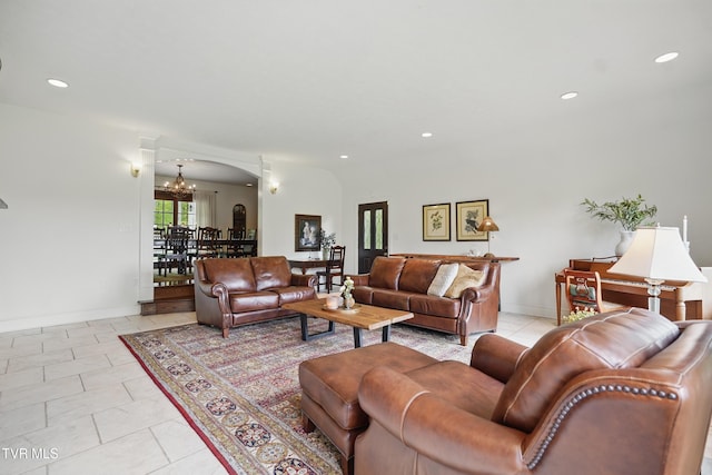 150 NW New Melrose St, Coeburn, VA 24230 - living room with arched walkways, a chandelier, baseboards, recessed lighting, and light tile patterned flooring