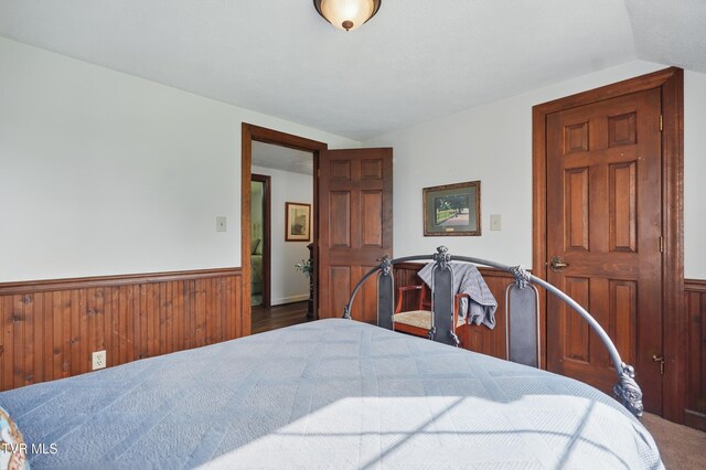 150 NW New Melrose St, Coeburn, VA 24230 - bedroom featuring a wainscoted wall and wooden walls