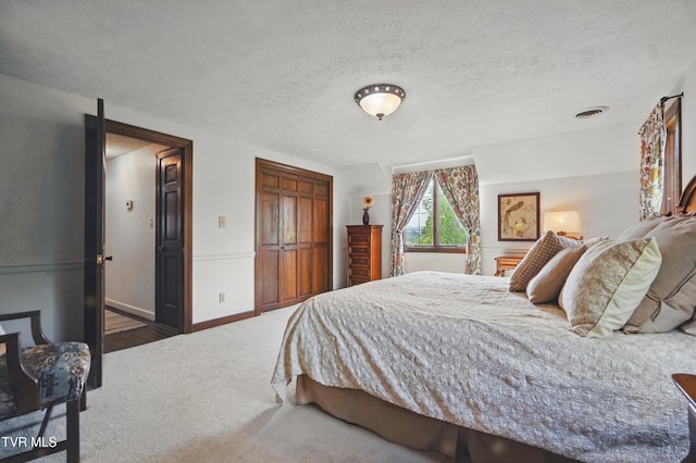 150 NW New Melrose St, Coeburn, VA 24230 - bedroom featuring a closet, carpet floors, baseboards, and a textured ceiling