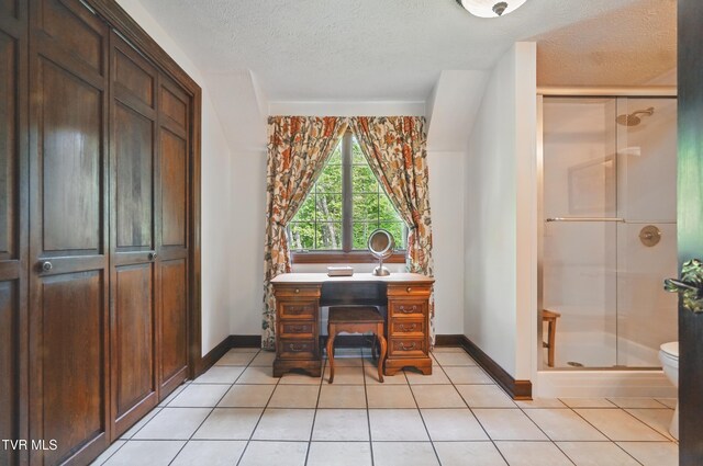 150 NW New Melrose St, Coeburn, VA 24230 - office with baseboards, a textured ceiling, and light tile patterned flooring