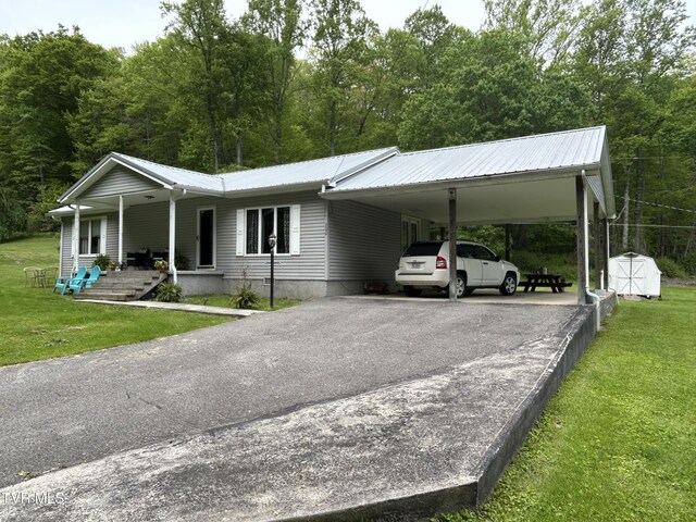 200 Glenbrook Mountain Rd, Keokee, VA 24265 - view of front of property featuring driveway, a front lawn, metal roof, a carport, and a porch