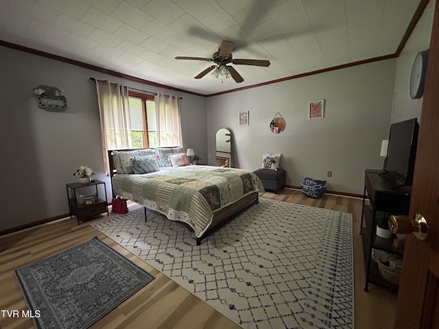 200 Glenbrook Mountain Rd, Keokee, VA 24265 - bedroom with ornamental molding, wood finished floors, baseboards, and ceiling fan