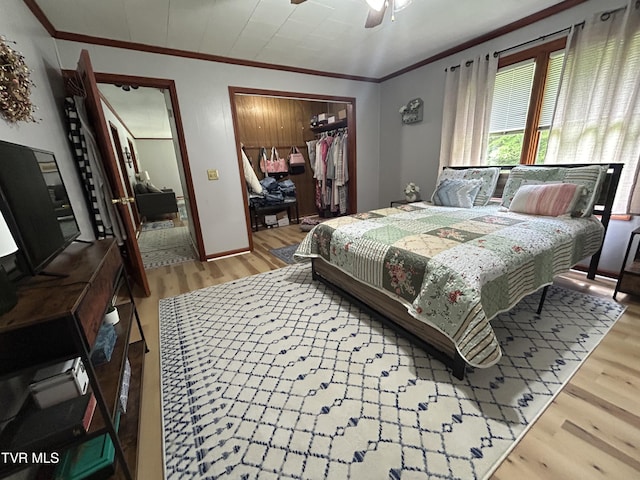 200 Glenbrook Mountain Rd, Keokee, VA 24265 - bedroom featuring wood finished floors, ornamental molding, a closet, a ceiling fan, and baseboards