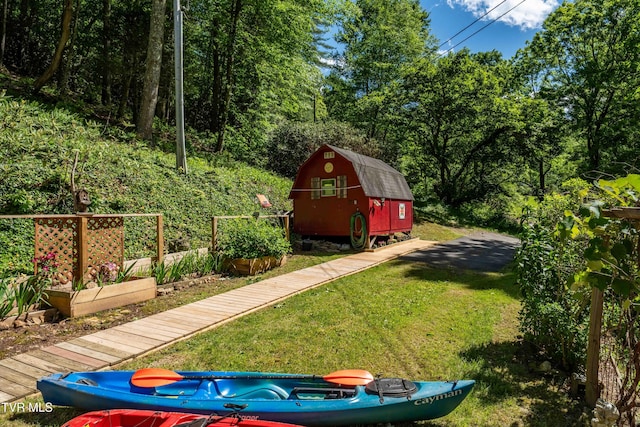 109 Hatley Hollow Rd, Butler, TN 37640 - view of green lawn featuring an outdoor structure