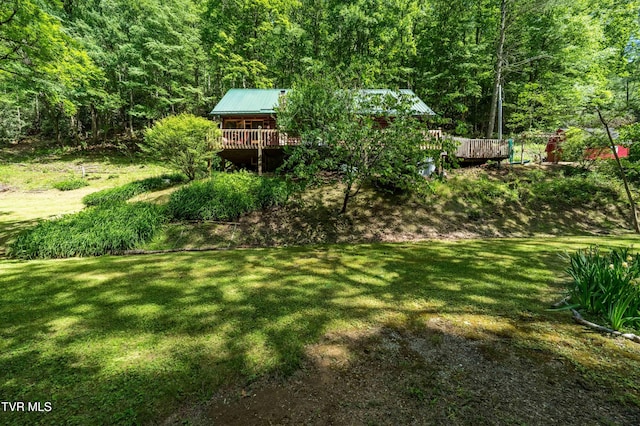 109 Hatley Hollow Rd, Butler, TN 37640 - view of grassy yard with a view of trees and a wooden deck