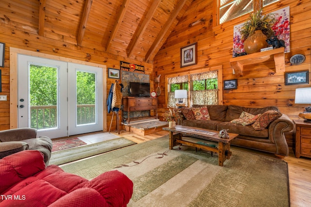 109 Hatley Hollow Rd, Butler, TN 37640 - living room featuring healthy amount of natural light, wooden walls, high vaulted ceiling, wood ceiling with exposed beams, and wood finished floors