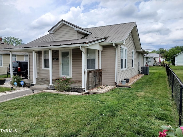 1318 Willow St, Kingsport, TN 37664 - view of front of house featuring covered porch, metal roof, and central AC