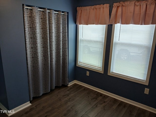 1318 Willow St, Kingsport, TN 37664 - spare room with dark wood-type flooring and baseboards