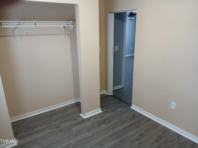 1318 Willow St, Kingsport, TN 37664 - unfurnished bedroom with dark wood-style flooring and baseboards