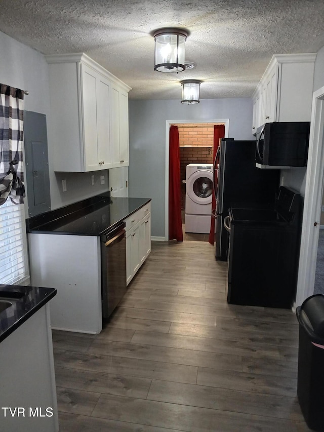 1318 Willow St, Kingsport, TN 37664 - kitchen featuring washer / clothes dryer, black appliances, electric panel, dark countertops, and white cabinetry