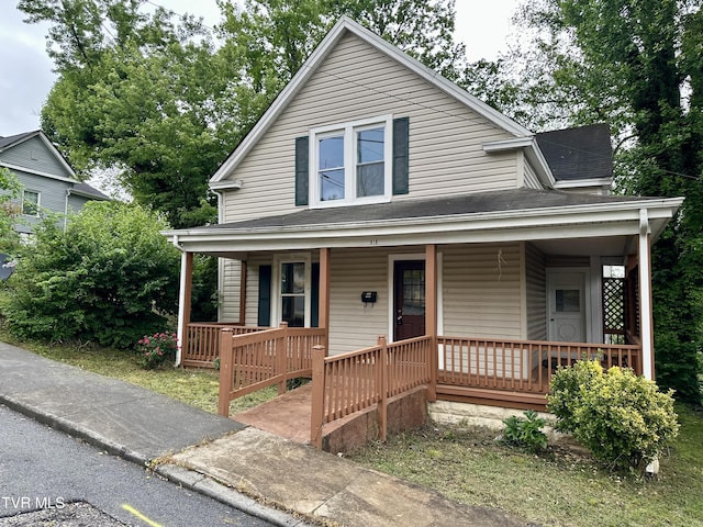 919 Russell St, Bristol, VA 24201 - view of front of home featuring covered porch and roof with shingles
