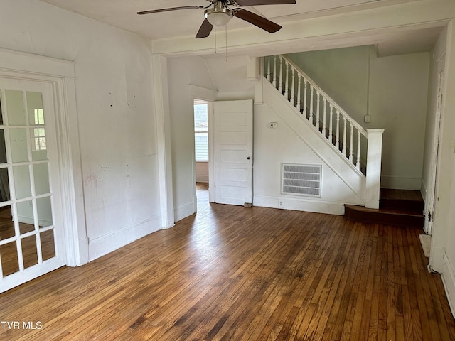 919 Russell St, Bristol, VA 24201 - unfurnished living room with hardwood / wood-style floors, stairway, a ceiling fan, vaulted ceiling, and baseboards