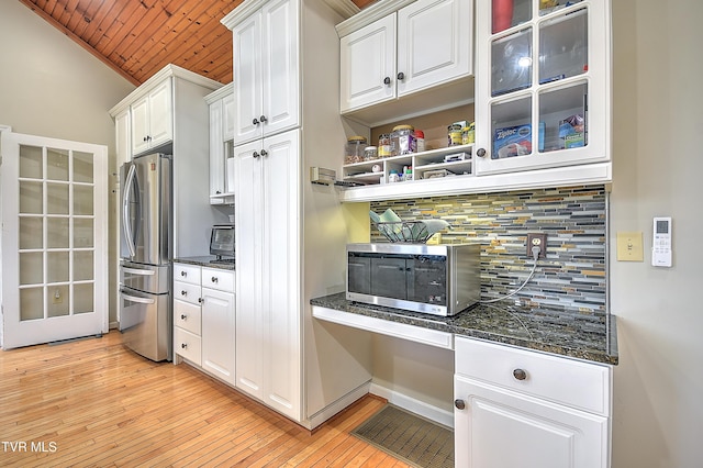 15497 Porterfield Hwy, Abingdon, VA 24210 - kitchen featuring stainless steel appliances, wooden ceiling, white cabinetry, backsplash, and light wood-type flooring