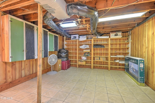 15497 Porterfield Hwy, Abingdon, VA 24210 - unfinished below grade area with tile patterned floors and wood walls