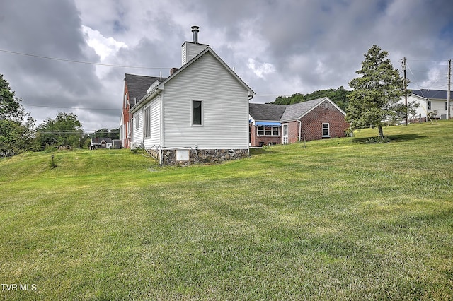 15497 Porterfield Hwy, Abingdon, VA 24210 - back of property featuring a chimney and a yard