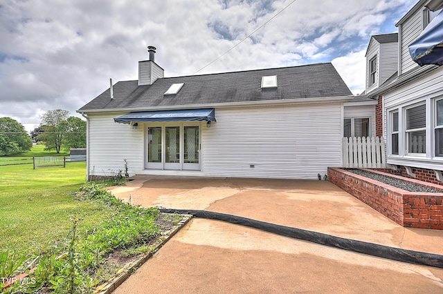 15497 Porterfield Hwy, Abingdon, VA 24210 - back of property with a patio area and a chimney