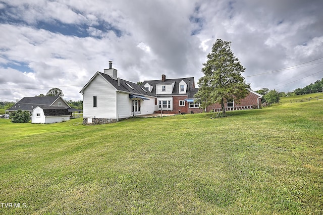 15497 Porterfield Hwy, Abingdon, VA 24210 - back of house featuring a chimney and a yard