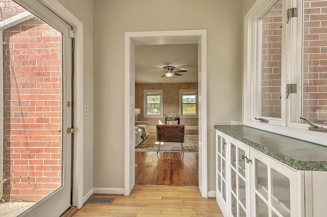 15497 Porterfield Hwy, Abingdon, VA 24210 - hallway featuring light wood-style flooring and baseboards
