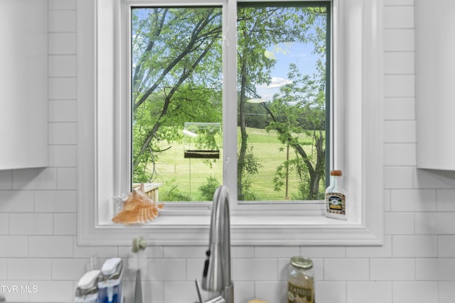 150 Big Springs Rd, Elizabethton, TN 37643 - kitchen view of backsplash and white cabinets