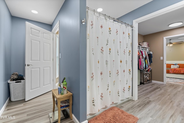 150 Big Springs Rd, Elizabethton, TN 37643 - bathroom with ceiling fan, wood finished floors, baseboards, and curtained shower