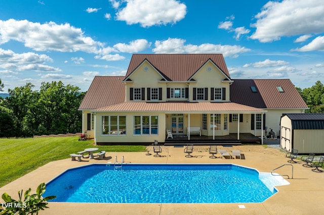 7540 Erwin Hwy, Chuckey, TN 37641 - rear view of property featuring a patio area, a yard, and metal roof