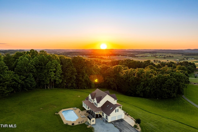 7540 Erwin Hwy, Chuckey, TN 37641 - aerial view of property and surrounding area featuring a heavily wooded area