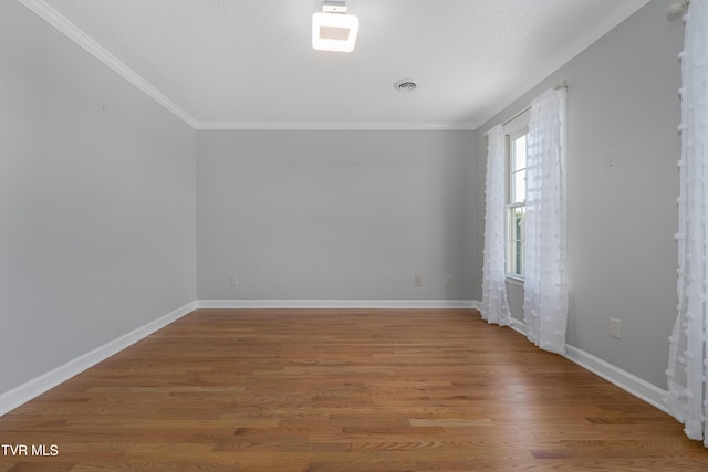 7540 Erwin Hwy, Chuckey, TN 37641 - empty room featuring ornamental molding, baseboards, and wood finished floors