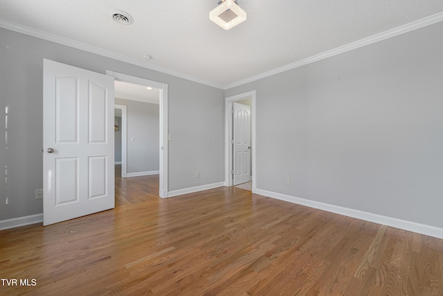 7540 Erwin Hwy, Chuckey, TN 37641 - unfurnished room featuring baseboards, ornamental molding, and light wood-style flooring