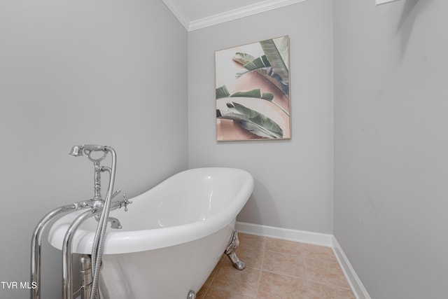 7540 Erwin Hwy, Chuckey, TN 37641 - bathroom featuring crown molding, a freestanding bath, baseboards, and tile patterned floors