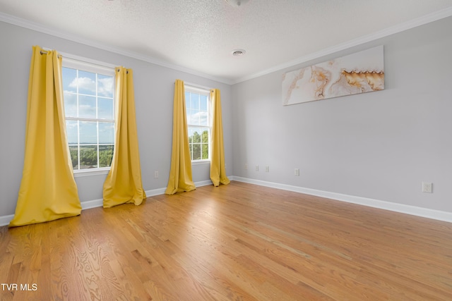 7540 Erwin Hwy, Chuckey, TN 37641 - unfurnished room featuring crown molding, a textured ceiling, light wood finished floors, and baseboards