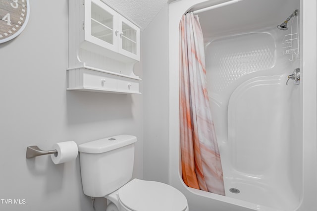 7540 Erwin Hwy, Chuckey, TN 37641 - full bathroom with toilet, a textured ceiling, and curtained shower