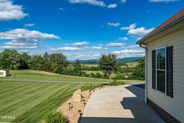 7540 Erwin Hwy, Chuckey, TN 37641 - view of green lawn featuring a patio and a mountain view
