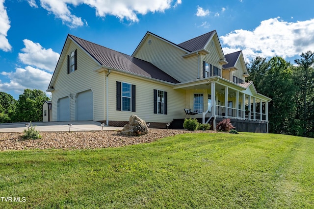 7540 Erwin Hwy, Chuckey, TN 37641 - view of front of property featuring covered porch, metal roof, a front yard, an attached garage, and driveway