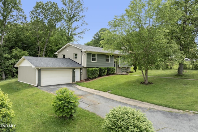 405 Castaway Dr, Kingsport, TN 37663 - view of front of home with driveway, a front yard, a garage, and a shingled roof